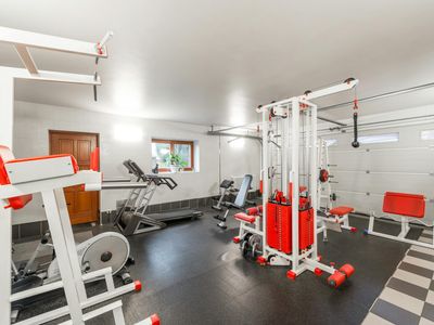 Modern minimalist gym interior with natural light.